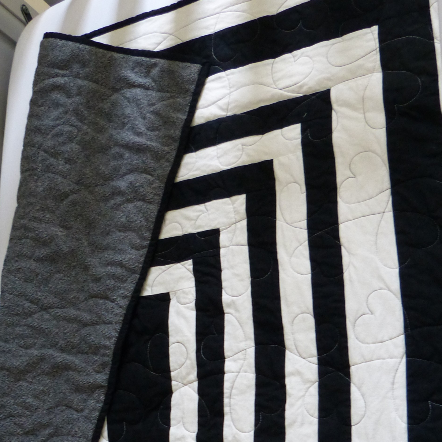 Echoes Baby/Toddler Quilt – Black & White with Cozy Fireside Backing