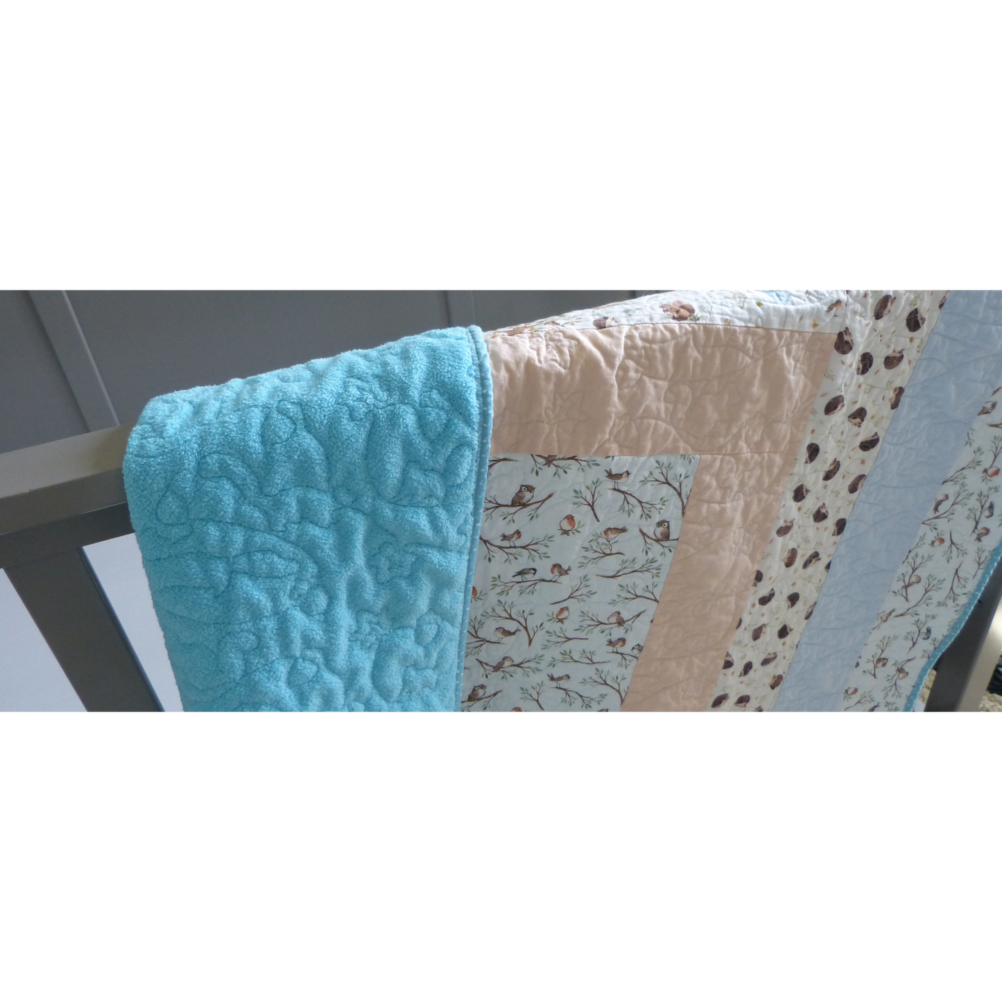 Bird and Hedgehog Baby/Toddler Quilt with Peach and Blue Background and Fireside Backing