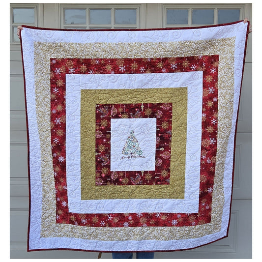 Quilted Holiday Throw Featuring Snowflake Fabrics, Embroidered Center and minky backing